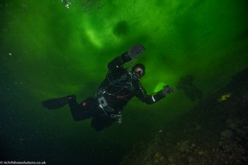 Ice diver below the ice in Russia. Rebreatherpro-Training