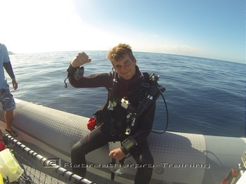 Rebreather diver celebrating passing his level 1 course Rebreatherpro-Training